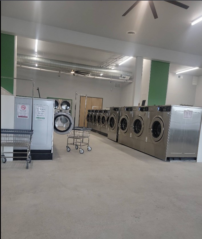 Washer and dryer rows inside the laundromat